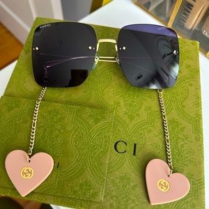 Brand new Gucci sunglasses with detachable pink heat charms